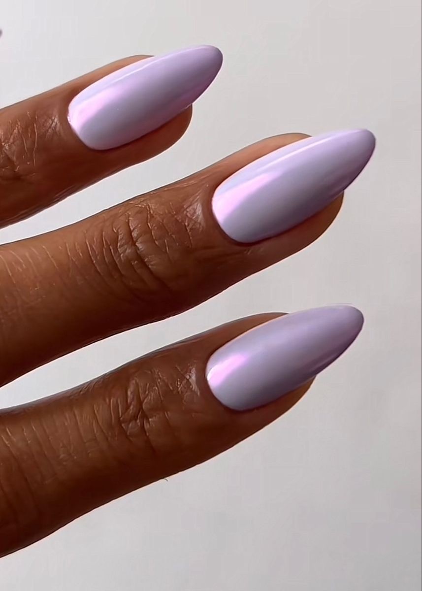 The Vibrant Contrast: Oval Nails’ Purple Sheen