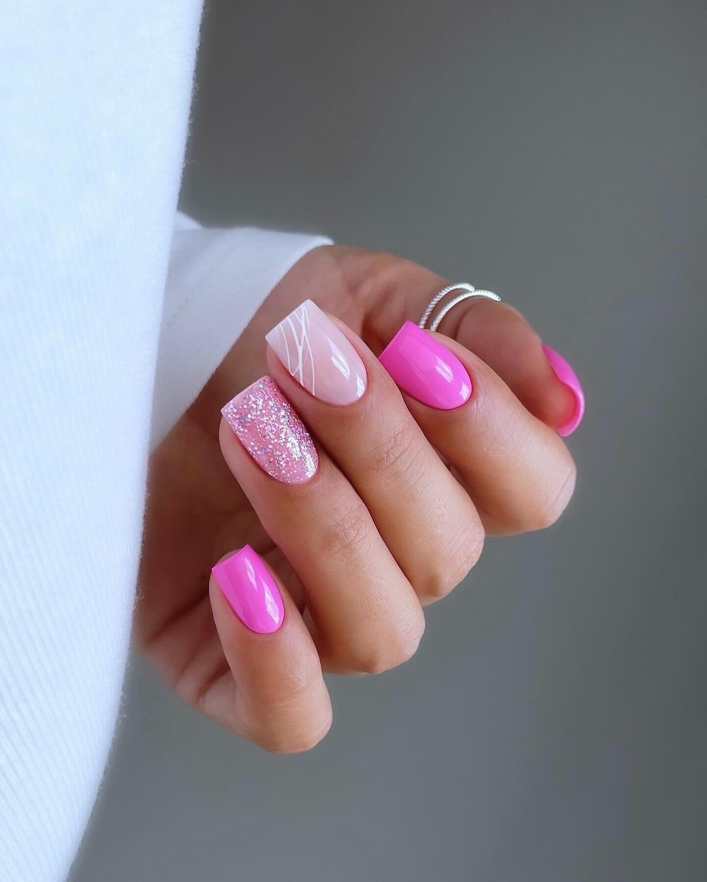 Pink and Glitter Nails with Abstract Design