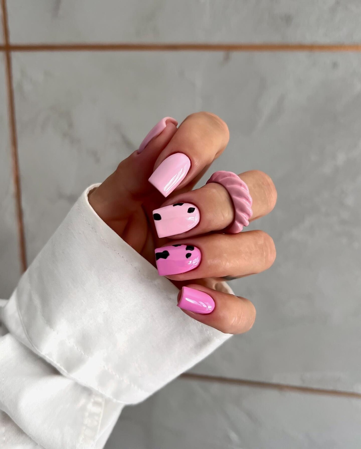 Playful Pink Cow Print Nails