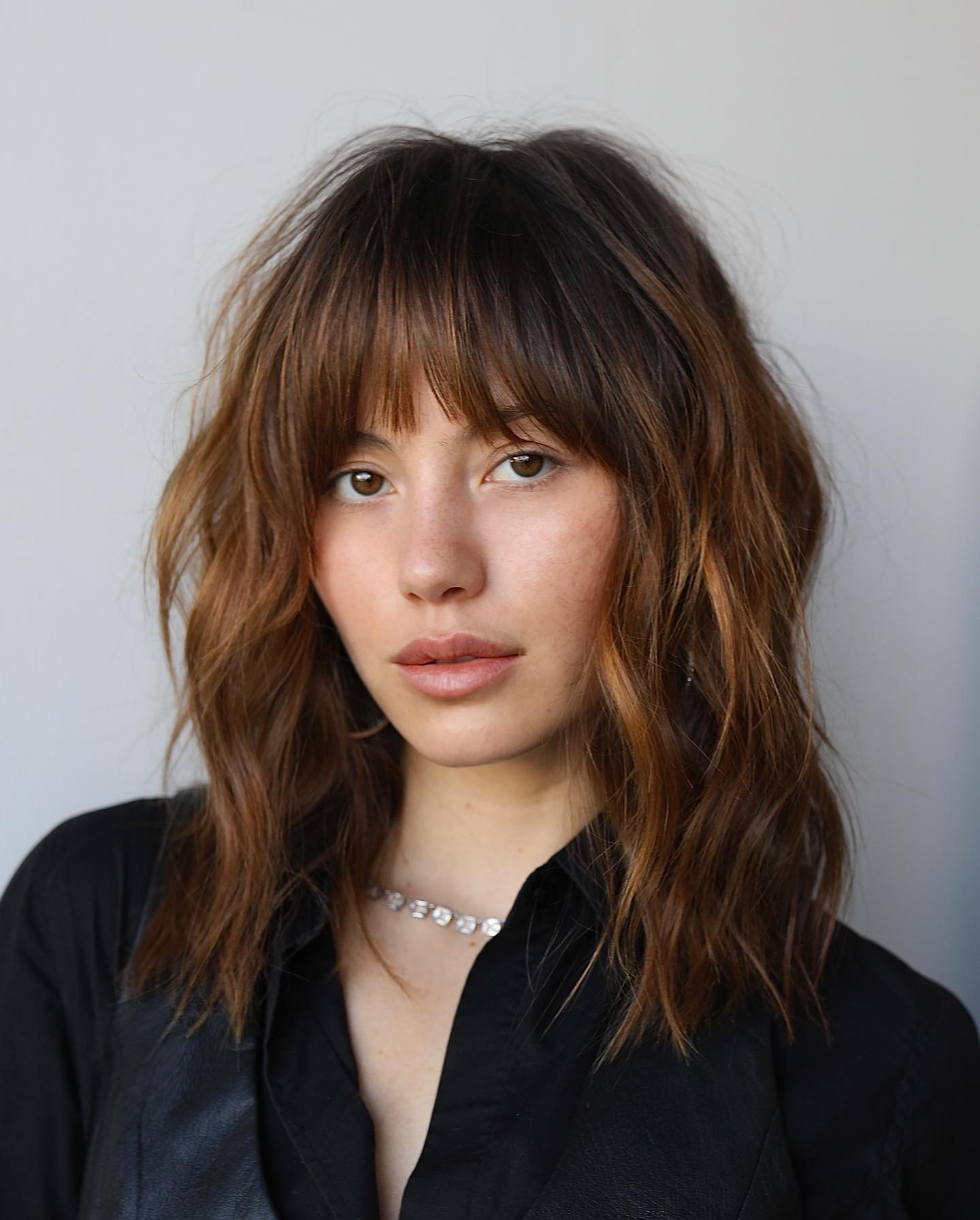 Tousled Elegance with Baby Bangs