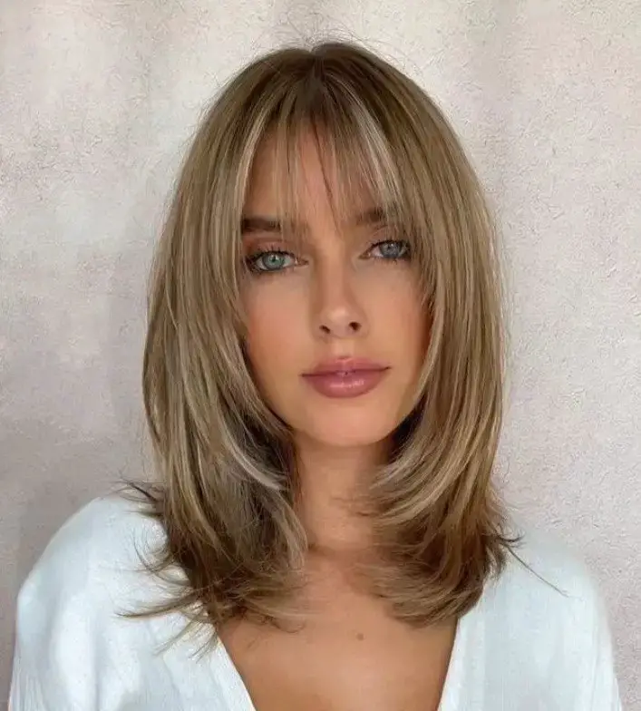 The Modern Fringe: Bangs and Layers Combined