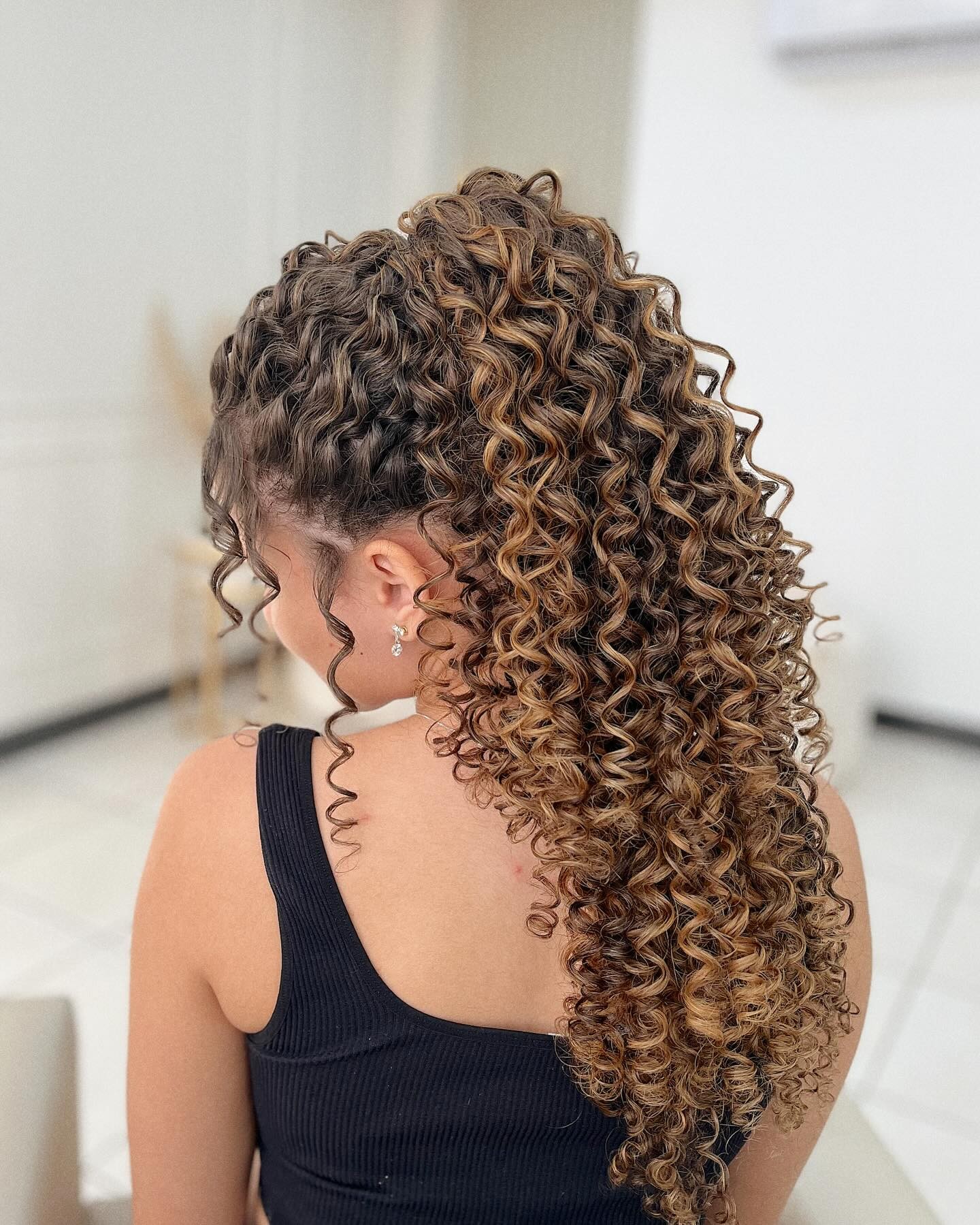 High Curly Ponytail with Volume