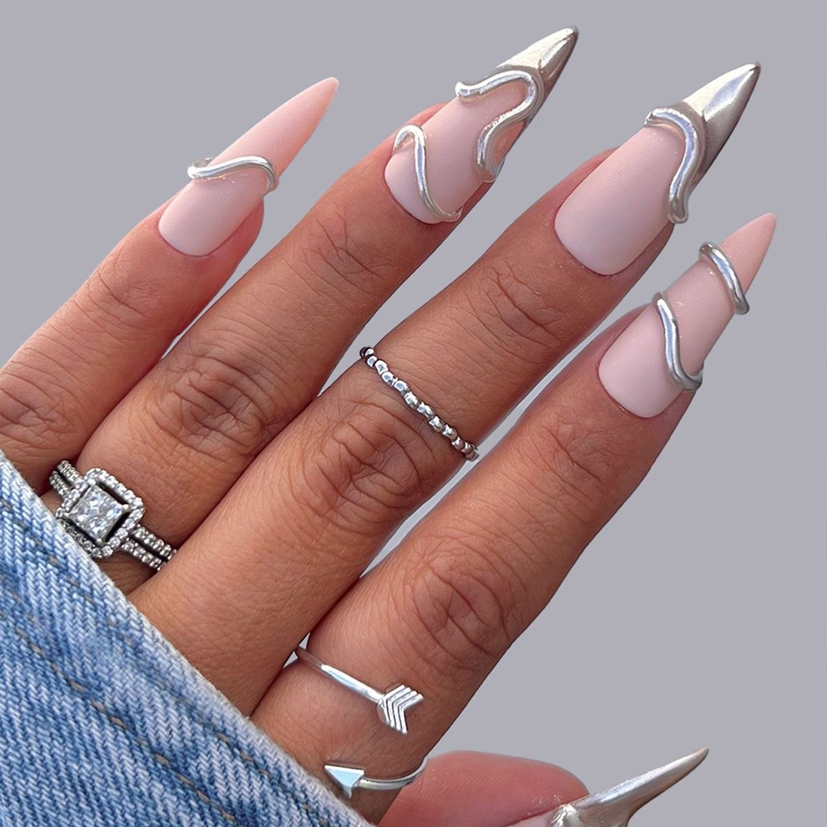 Silver and Nude Swirl Nails