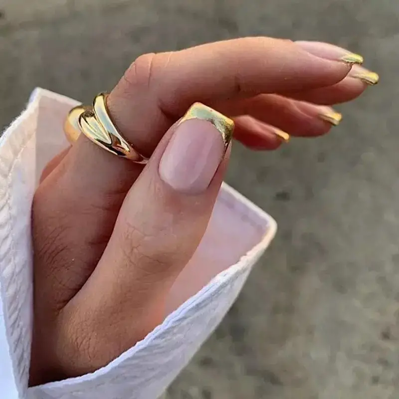 Minimalist Chic with Gold Chrome Tips