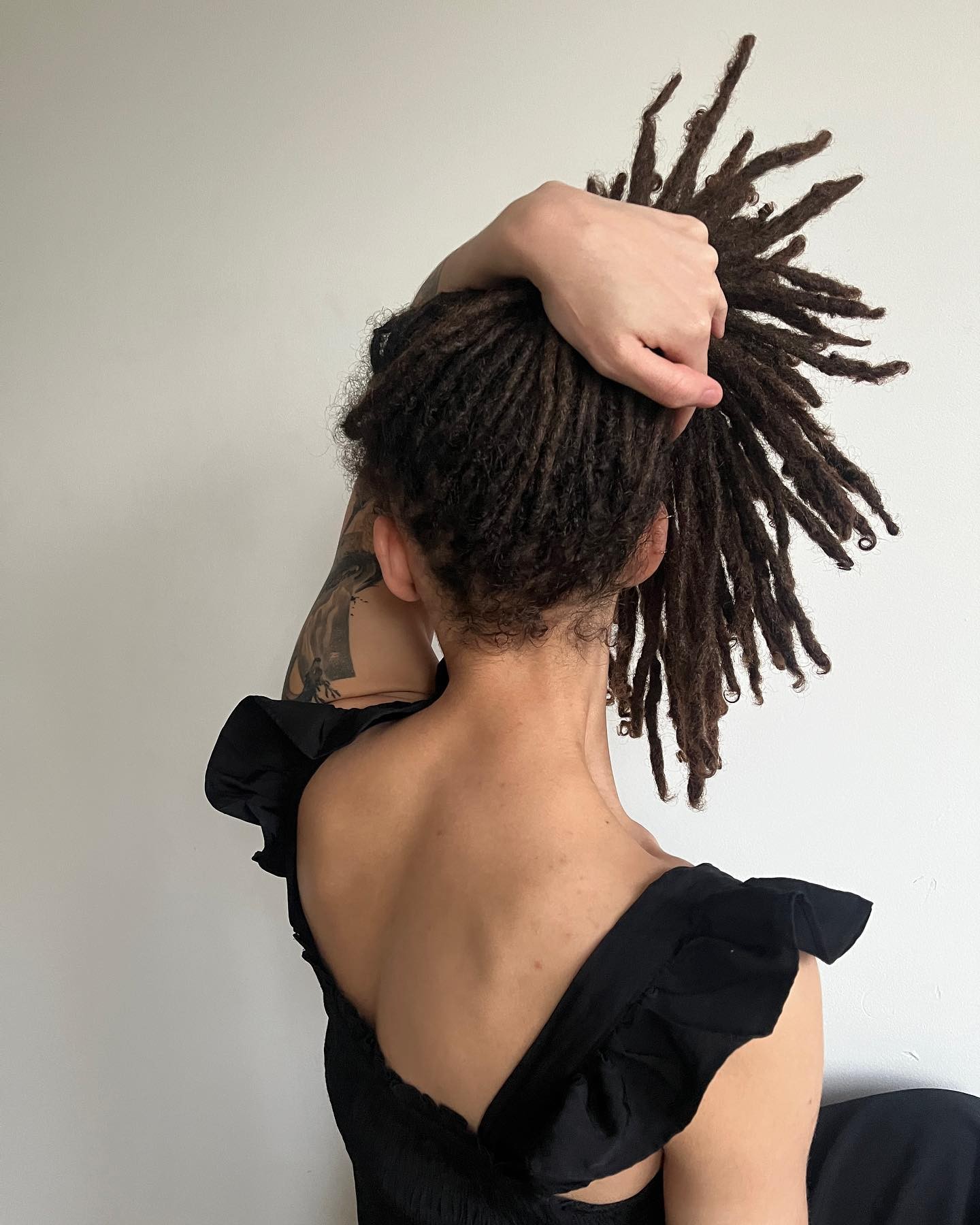 The Graceful Updo: Long Dreadlocks Tied Up