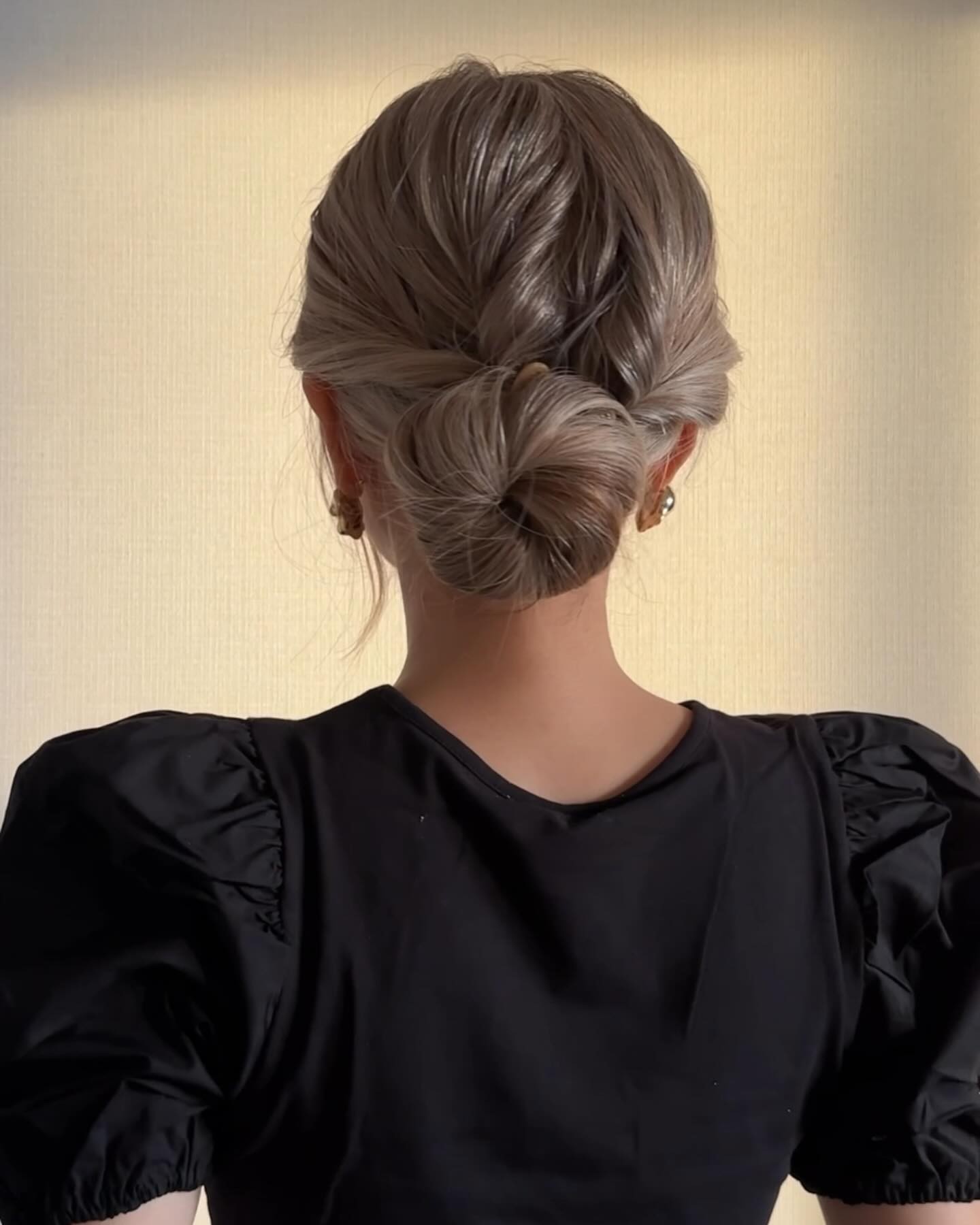 Low Bun with Twists