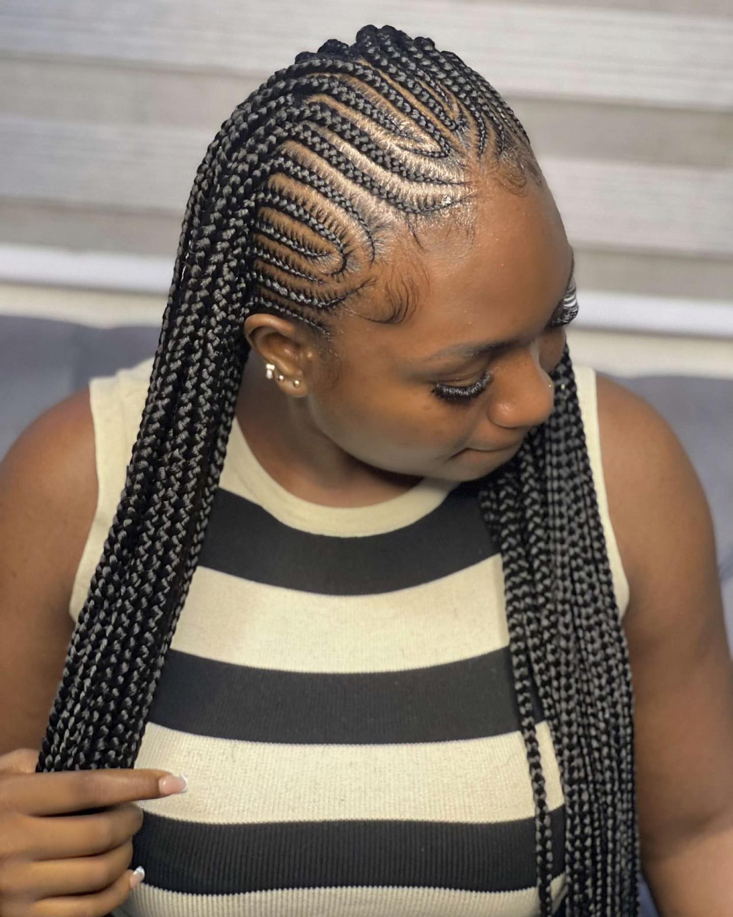 Sleek and Chic: Side-Swept Cornrows