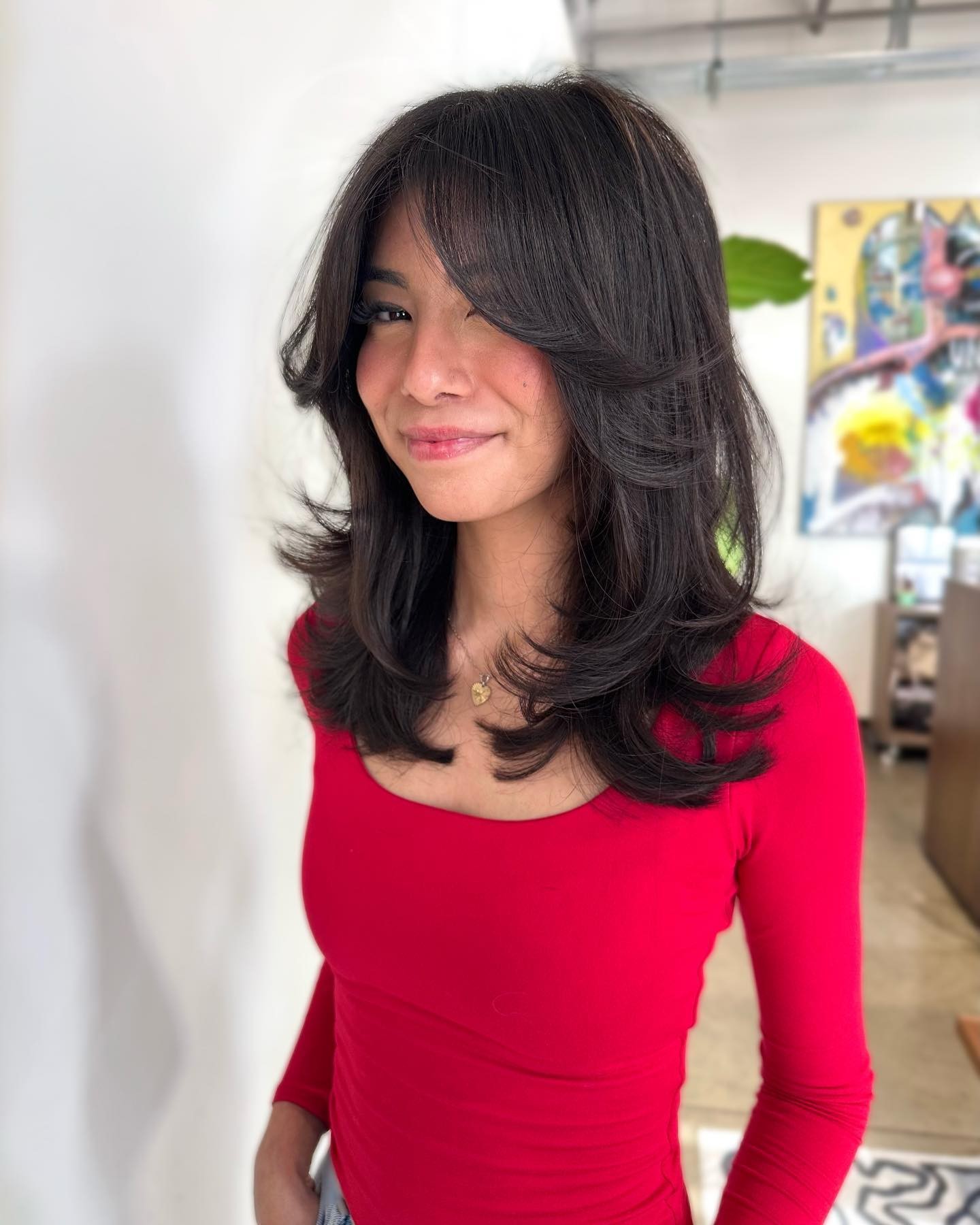 Bouncy Blowout with Side-Swept Bangs