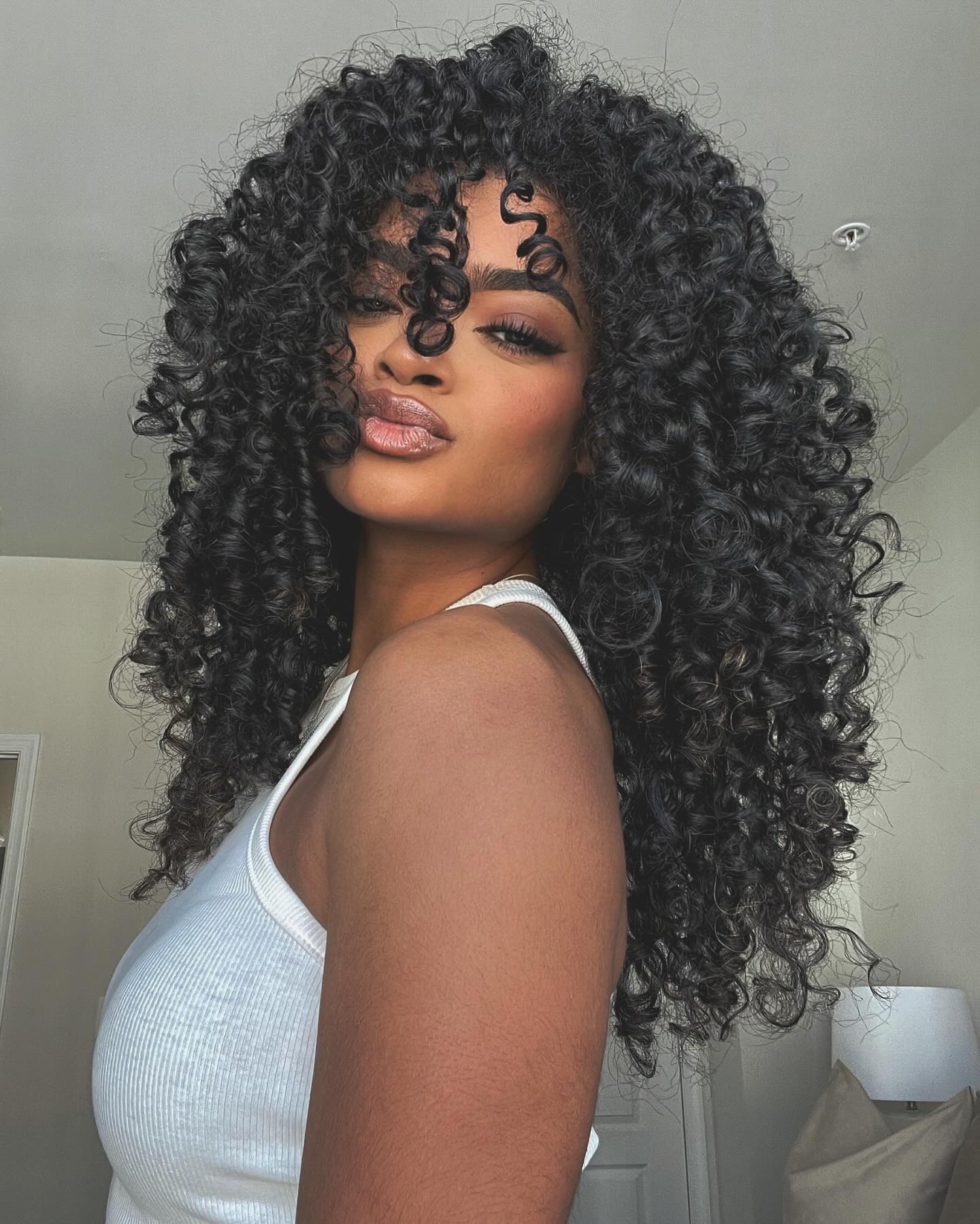 Voluminous Curls with a Sassy Edge