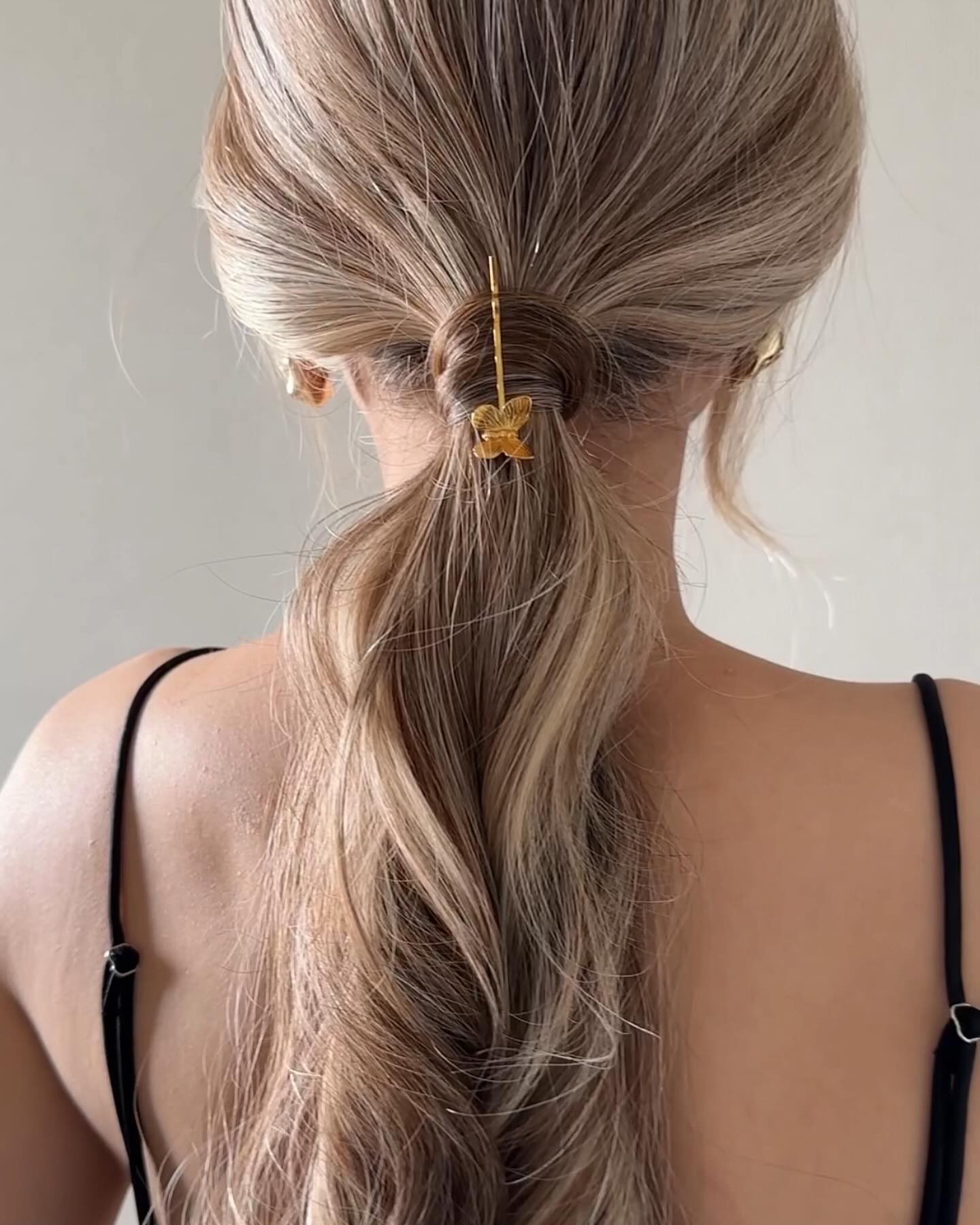 Gold-Accented Low Ponytail